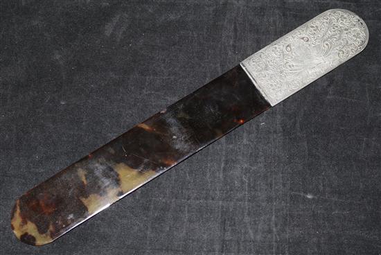 An Indian tortoiseshell and engraved white metal paperknife and a painted staff